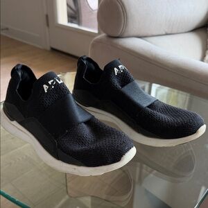 APL woman’s  Black and White Slip-On Sneakers